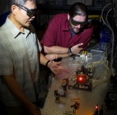 Cutting Edge Magazine - Diego Janches and Anthony Wu with their sodium lidar laser