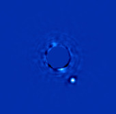 Снимок прибора GPI, показывающий планету, вращающуюсяся вокруг звезды Beta Pictoris