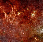 Инфракрасный вид на центр Млечного Пути (комбинированный снимок данных космических телескопов «Спитцер» и «Хаббл»)