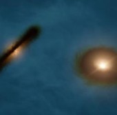 Протопланетные диски бинарной звездной системы HK Tauri в представлении художника